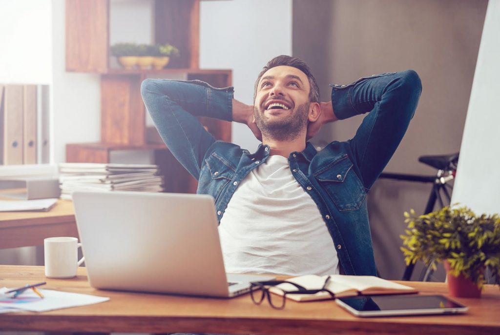 happy man on laptop